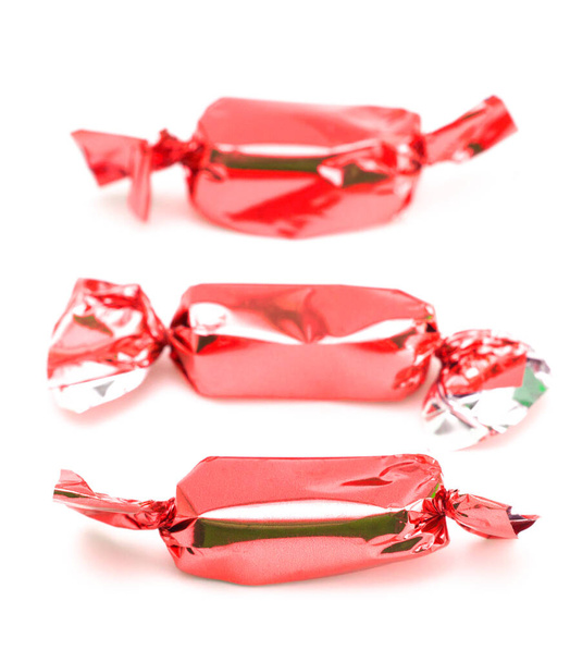 Red Wrapped Candy on a White Background - Photo, Image