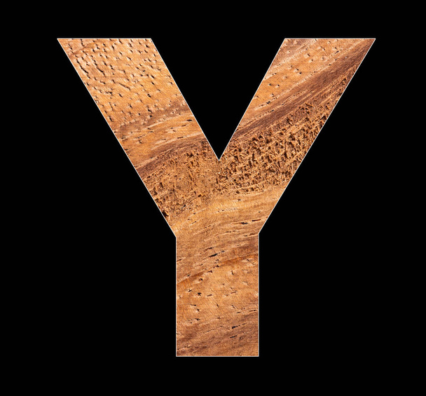 Wooden alphabet capital letter Y - Black background - 写真・画像