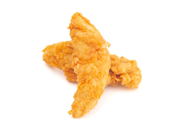 Dedos de pollo frito dorado sobre fondo blanco - Foto, Imagen