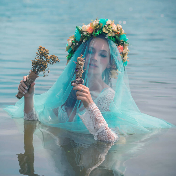 Bride nymph at water, Slavic rituals, pagan magic scene, nature power concept - Photo, Image