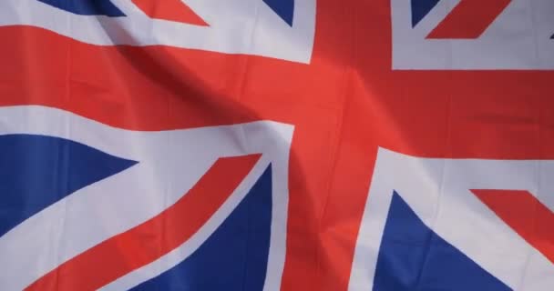 Národní britská vlajka vlaje ve větru. - Záběry, video