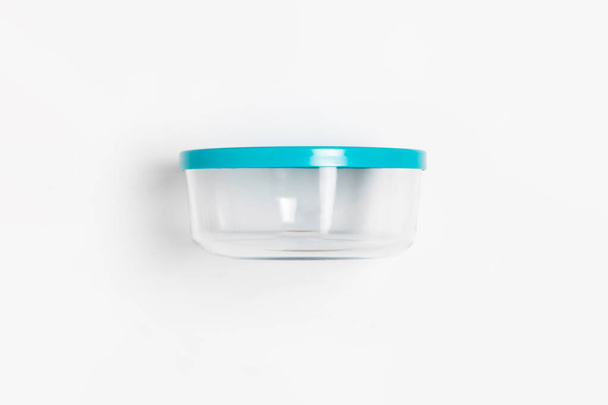 Glass food container with plastic lid isolated on white background. Storage container.High-resolution photo. - Valokuva, kuva