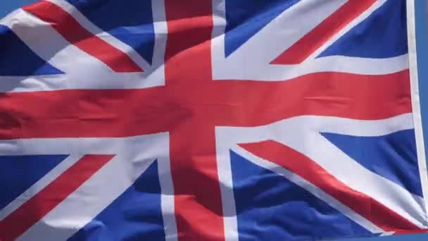 La bandera nacional británica ondeando en el viento. - Imágenes, Vídeo
