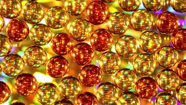 Tausta hehkuva kulta ja oranssi pallot juhlava valot takana, joulu, loma tai osapuoli teema. - Materiaali, video