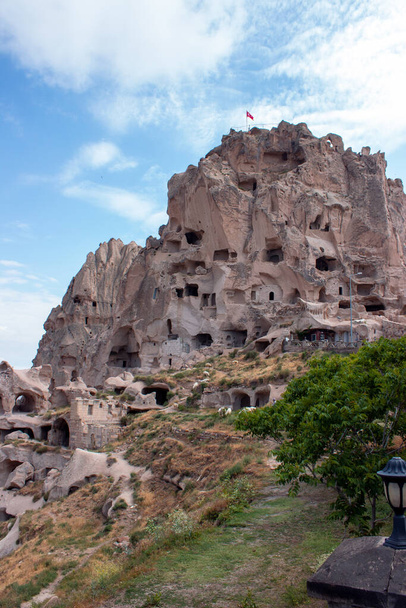 The famous picture of the Uchisar castle. Amazing cave castle. The amazing fairy chimney castle. - Foto, Bild