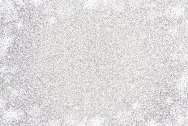 Ein einfacher silberfarbener Hintergrund mit weißem Lichtrand - Foto, Bild