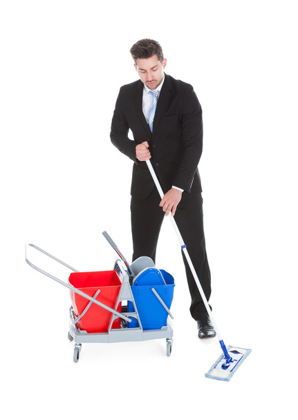 Businessman Mopping - Foto, afbeelding