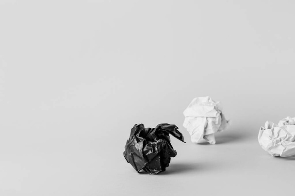 Crumpled papers on white background. Concept of racism - Fotoğraf, Görsel