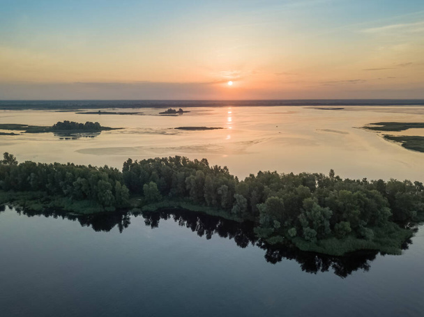 Sunrise over the wide river Dnieper. Aerial drone view. - Photo, image