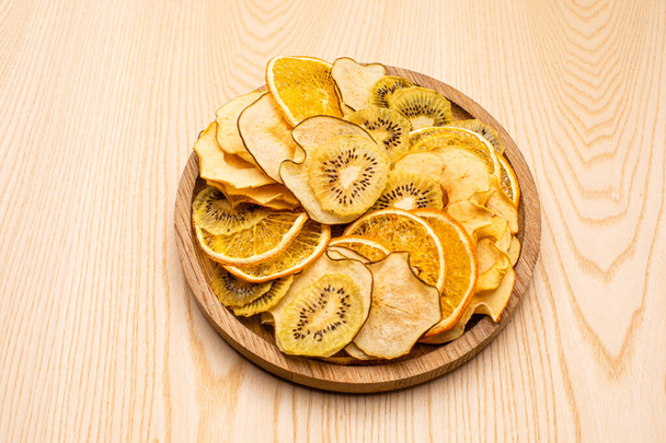 Different dried fruits heap on the table - 写真・画像