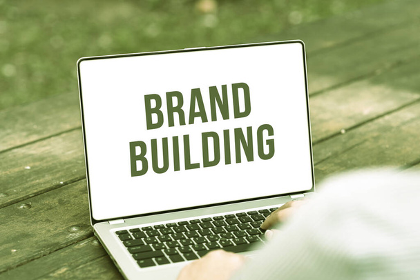 Handwriting text Brand Building. Concept meaning boosting customer s is knowledge over a certain business Online Jobs And Working Remotely Connecting People Together - Foto, imagen