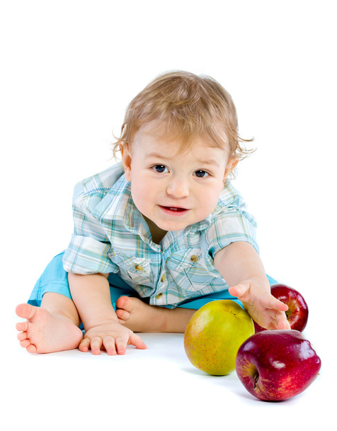 Beautiful baby boy play with green and red apples. Closeup portrait. Isolated. - Foto, afbeelding