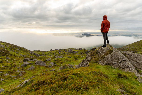 A Caucasian man from Ireland hiking in mountains - Zdjęcie, obraz
