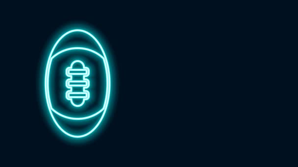 Glowing neon line American Football ball icon isolated on black background. Rugby ball icon. Team sport game symbol. 4K Video motion graphic animation - Footage, Video
