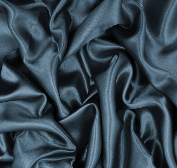 Smooth elegant dark grey silk or satin texture can use as abstract background. Luxurious background design - Foto, Imagen