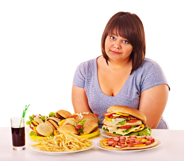 Nő eszik Fast Food. - Fotó, kép