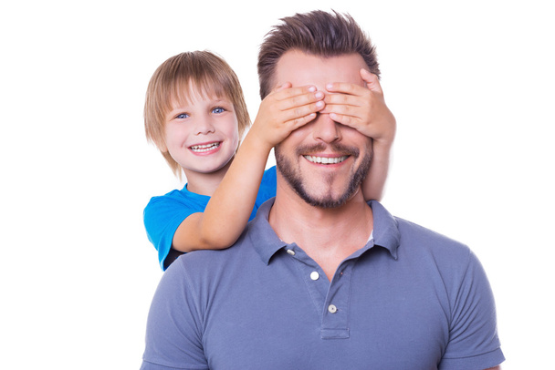 Boy covering his father eyes - Photo, Image