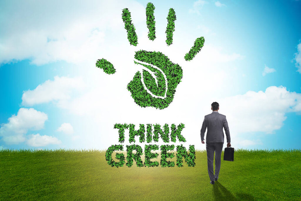 Think green ecological concept with businessman - Photo, Image