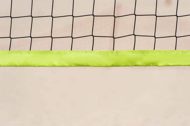 Beach volleyball and beach tennis net on the background of sand. Summer sport concept. - Fotoğraf, Görsel