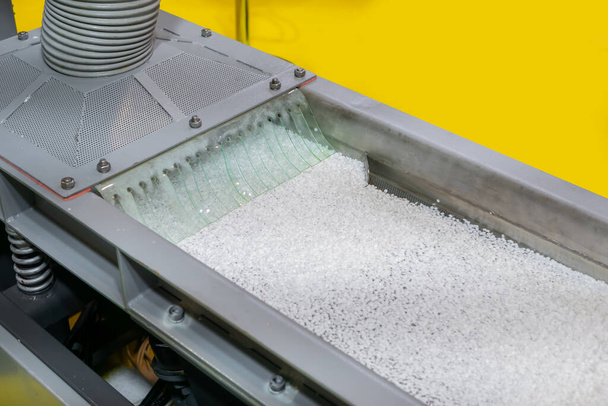 Recycled plastic granules on automatic shale shaker, conveyor belt - Photo, Image