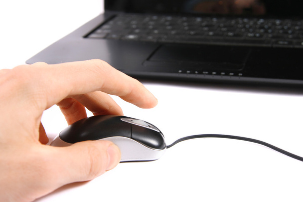 Hand clicking computer mouse - Photo, Image