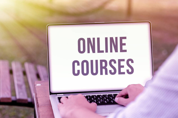Sign displaying Online Courses. Business idea earning an education that is conducted over the Internet Online Jobs And Working Remotely Connecting People Together - Photo, Image