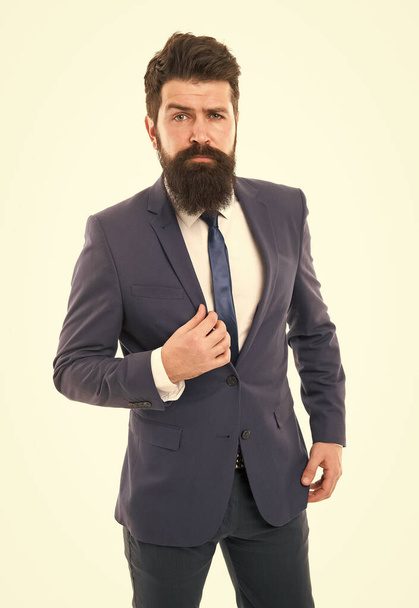 insurance agent. hipster with beard has own business. office life. modern business success. bearded businessman or insurance agent in formal suit. brutal boss man on white. serious insurance agent - Foto, imagen