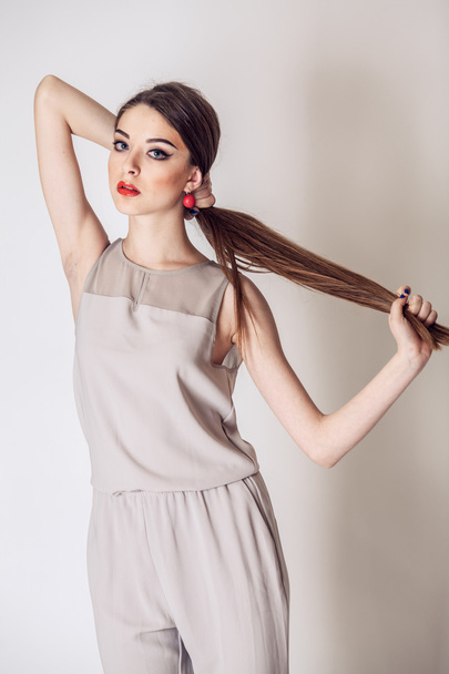 Fashion photo of young woman in beige. Fashion photo - Photo, Image