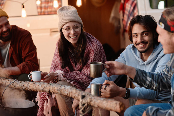 People drinking tea outdoors - Фото, зображення