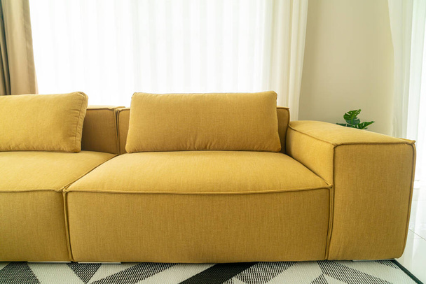 empty yellow fabric sofa decoration interior in living room at home - Фото, изображение