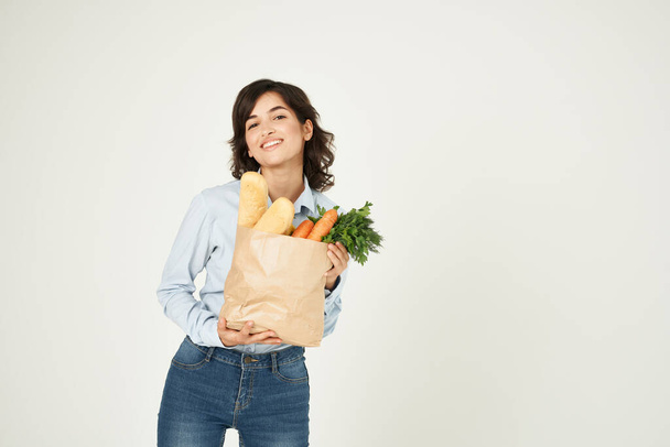 woman with package of groceries delivery shopping isolated background - 写真・画像