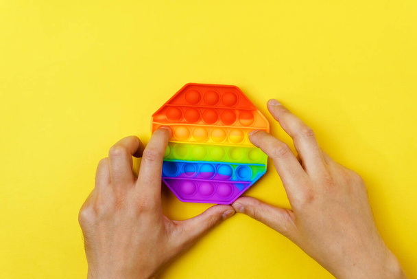 Pop it toy silicone sensory anti stress fidget toy colorful rainbow game. Trendy push bubble toys - Foto, Imagem