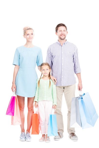 Family With Shopping Bags - 写真・画像