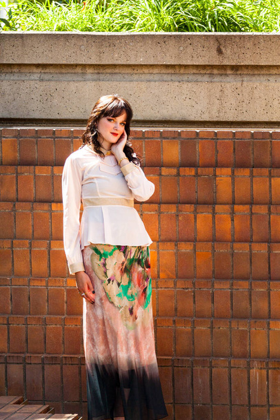Calgary, Canada - August 10, 2014: Model showing Arab style fashion in public place at Olympic Plaza.  - Fotó, kép