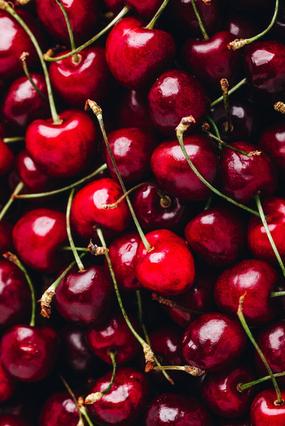 Cherry. Sweet Cherries background. Ripe Sweet Red Cherries. Top view - Photo, Image