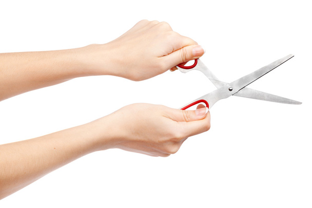 Female hand holding scissors - Photo, Image