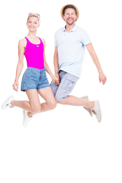 Happy Couple Jumping - Valokuva, kuva