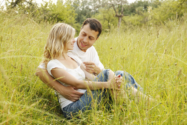 Young  couple in love outdoors - Valokuva, kuva