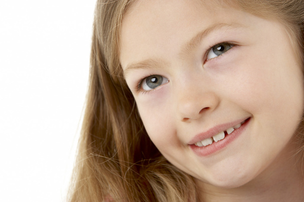 Studio Portrait of Smiling Girl - Foto, afbeelding