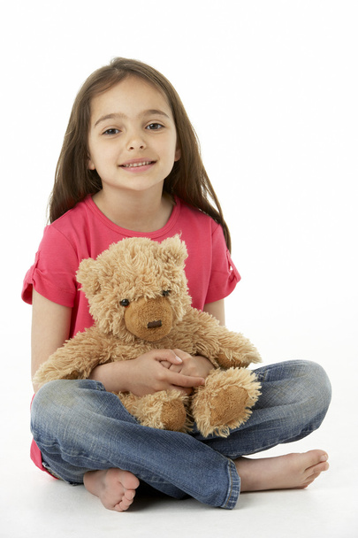 Studio Portrait Of Smiling Girl with Teddy Bear - Foto, Imagem