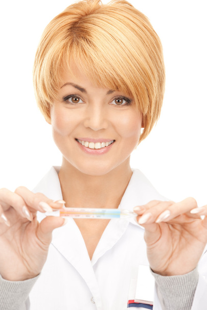 Picture of attractive female doctor with thermometer - Photo, image