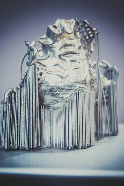 Dental crowns printed in laser sintering machine. - Photo, Image