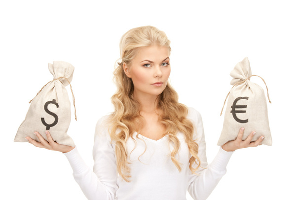 Picture of woman with euro and dollar bags - Foto, Imagen