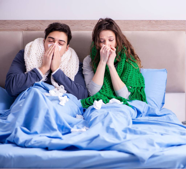 Sick wife and husband in bed in home - Zdjęcie, obraz