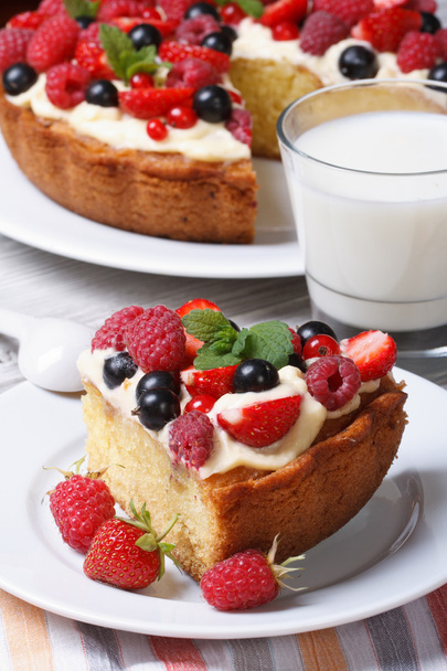 piece of berry cake with raspberries, strawberries and milk - Photo, Image