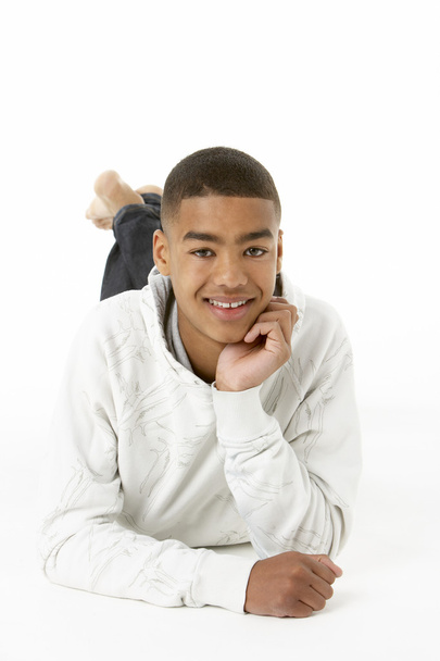 Studio Portrait Of Smiling Teenage Boy - Фото, изображение