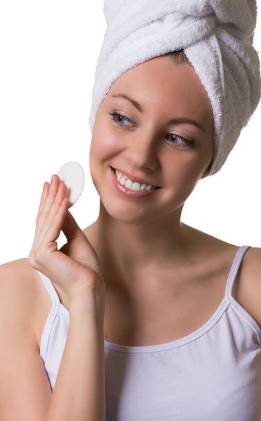 Beauty woman cleaning a face with cutton pad. - Photo, Image