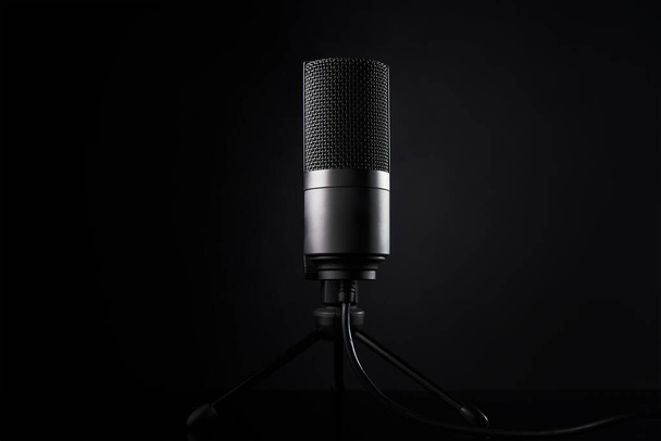 Studio microphone on dark background - Fotoğraf, Görsel