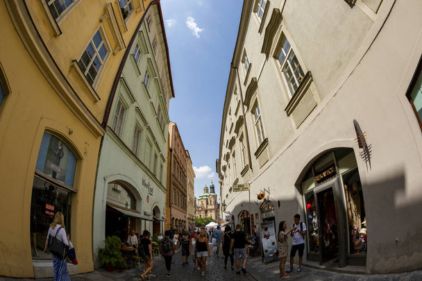 Praque, Czech Republic - JULY 5, 2018: Downtown of Praque, tourists walking on streets  - Foto, afbeelding