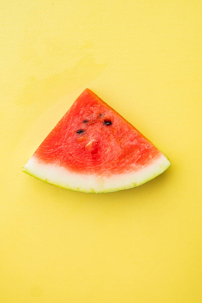 Slice of watermelon set, on yellow textured summer background, top view flat lay, with copy space for text - Foto, immagini